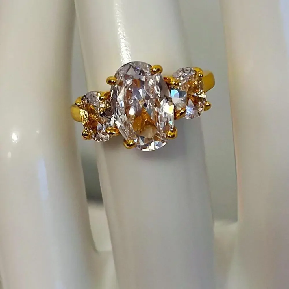18k gold plated ring with 3 prong CZ diamonds